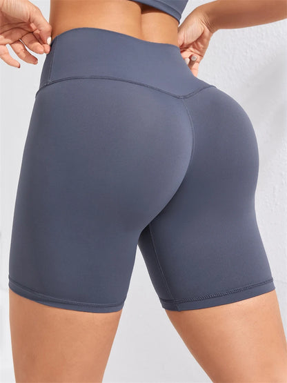 High-waisted women’s yoga shorts seamless, stretchy, squat proof, and sweat wicking fabric.