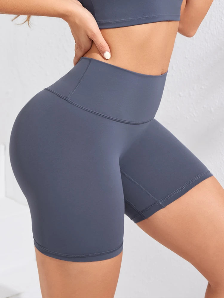 High-waisted women’s yoga shorts seamless, stretchy, squat proof, and sweat wicking fabric.